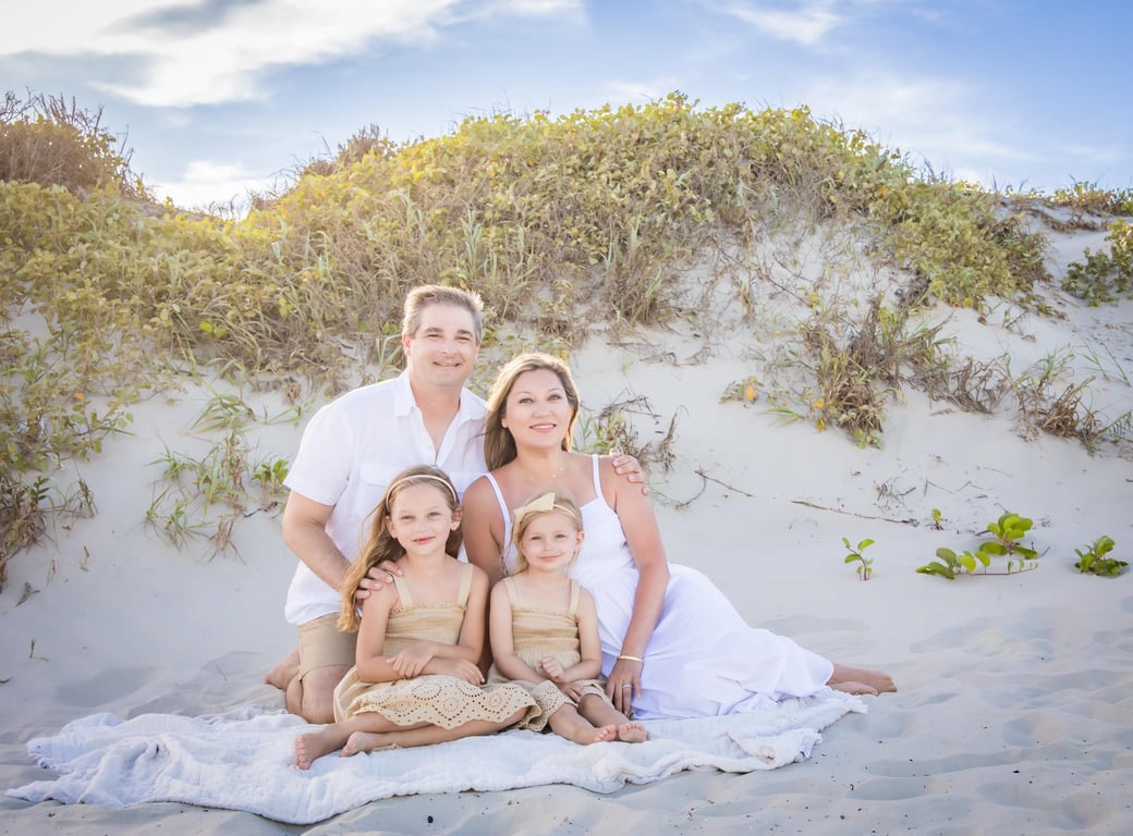 Family portrait session in the dunes at Cinnamon Shore in Port Aransas, Texas