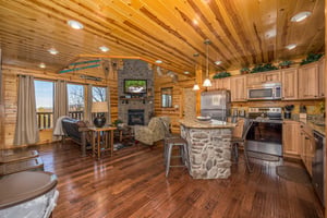 Full kitchen with island and chairs