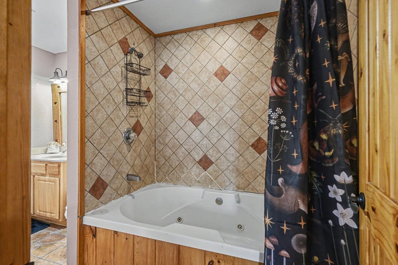 Soak your worries away in your private jetted tub surrounded by rustic charm and elegant tilework.