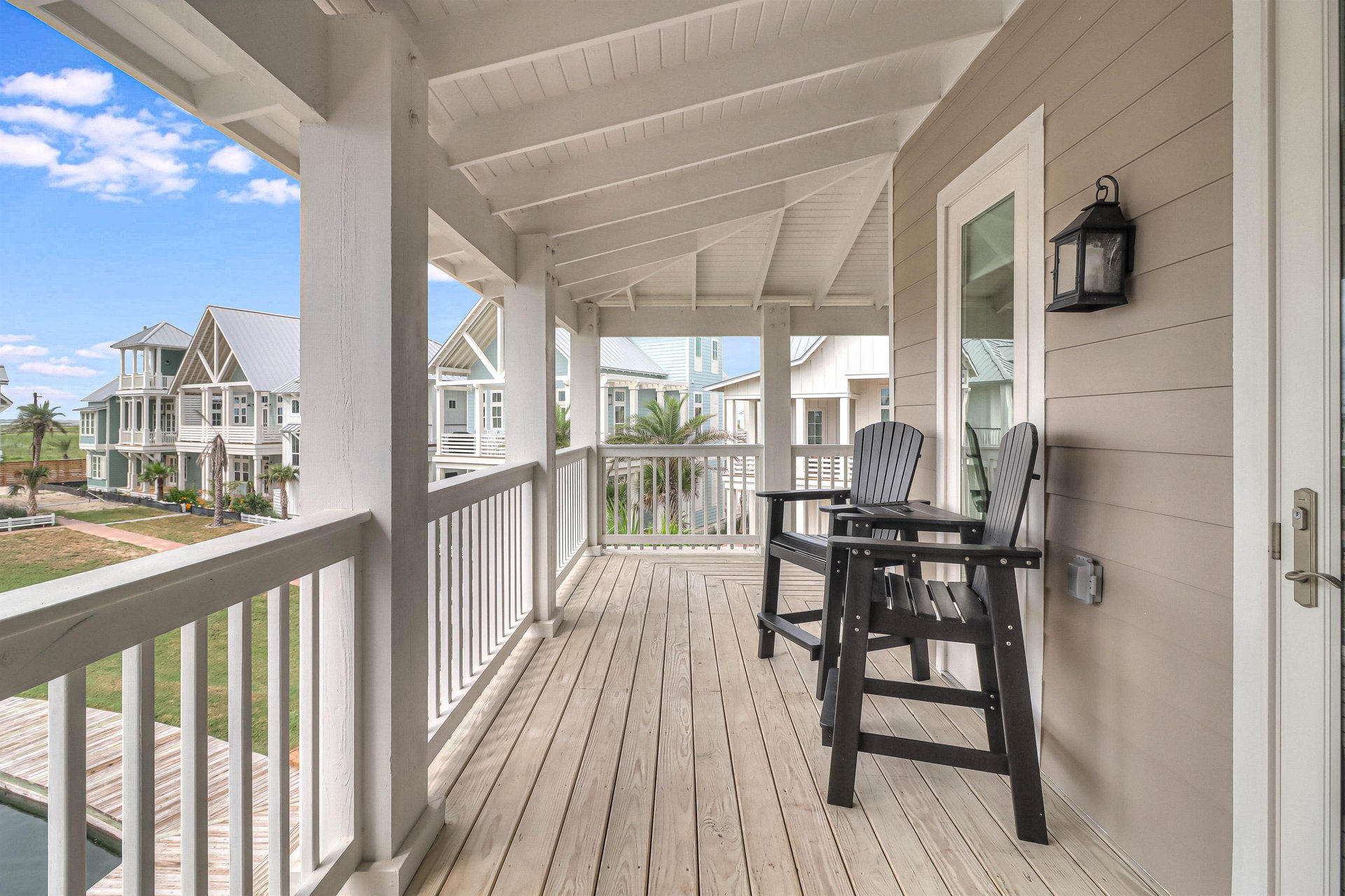 2nd Floor Rear Balcony overlooking lake with bay views