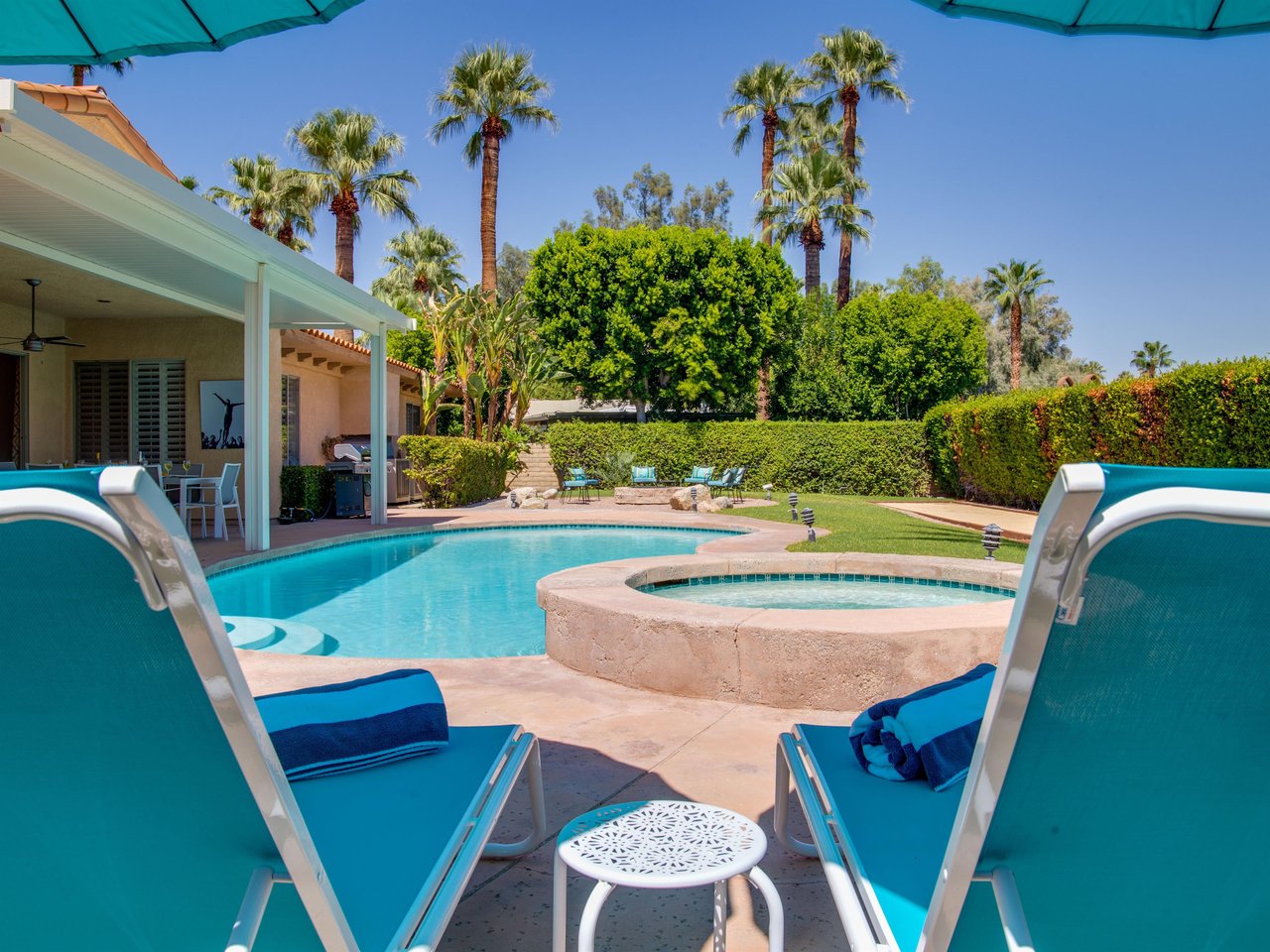 Enjoy a cocktail while relaxing poolside