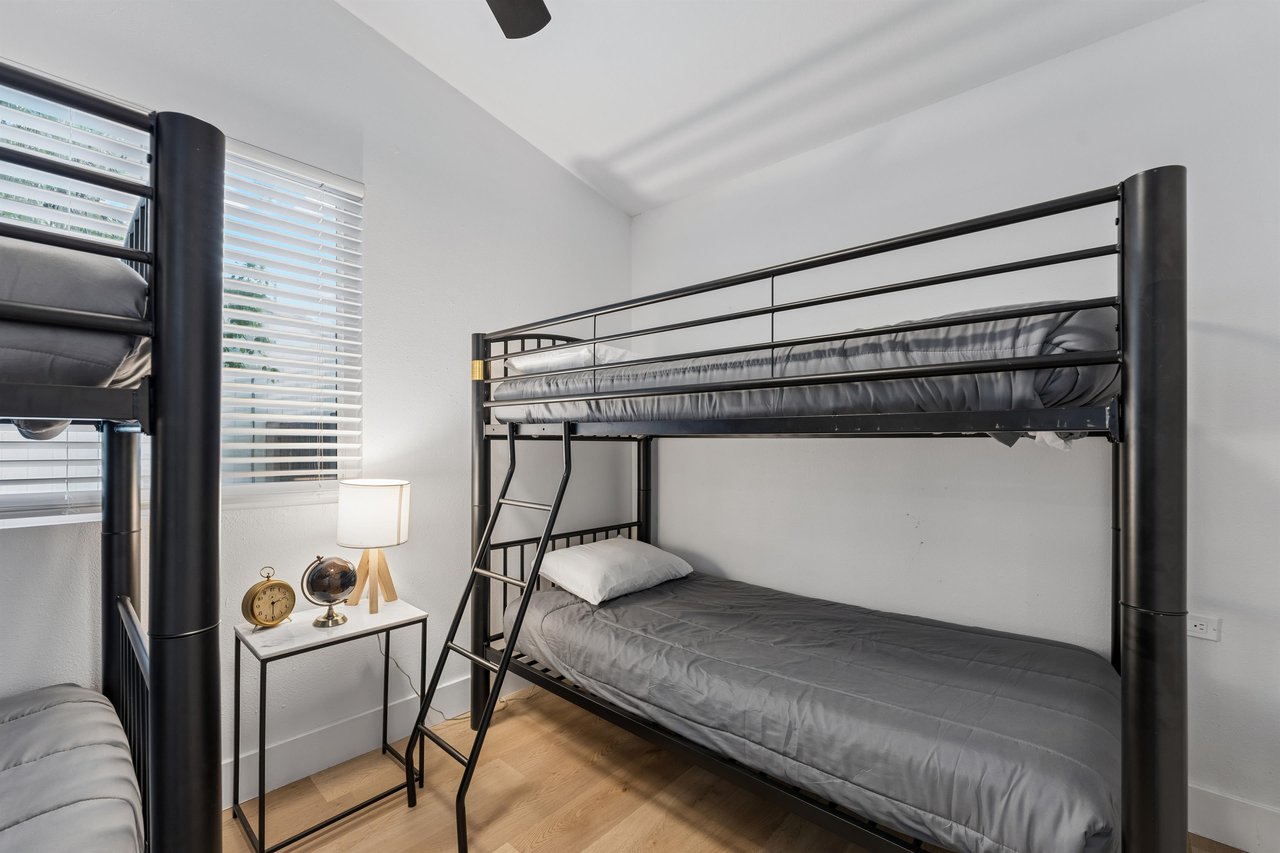 Two twin over twin bunk beds.