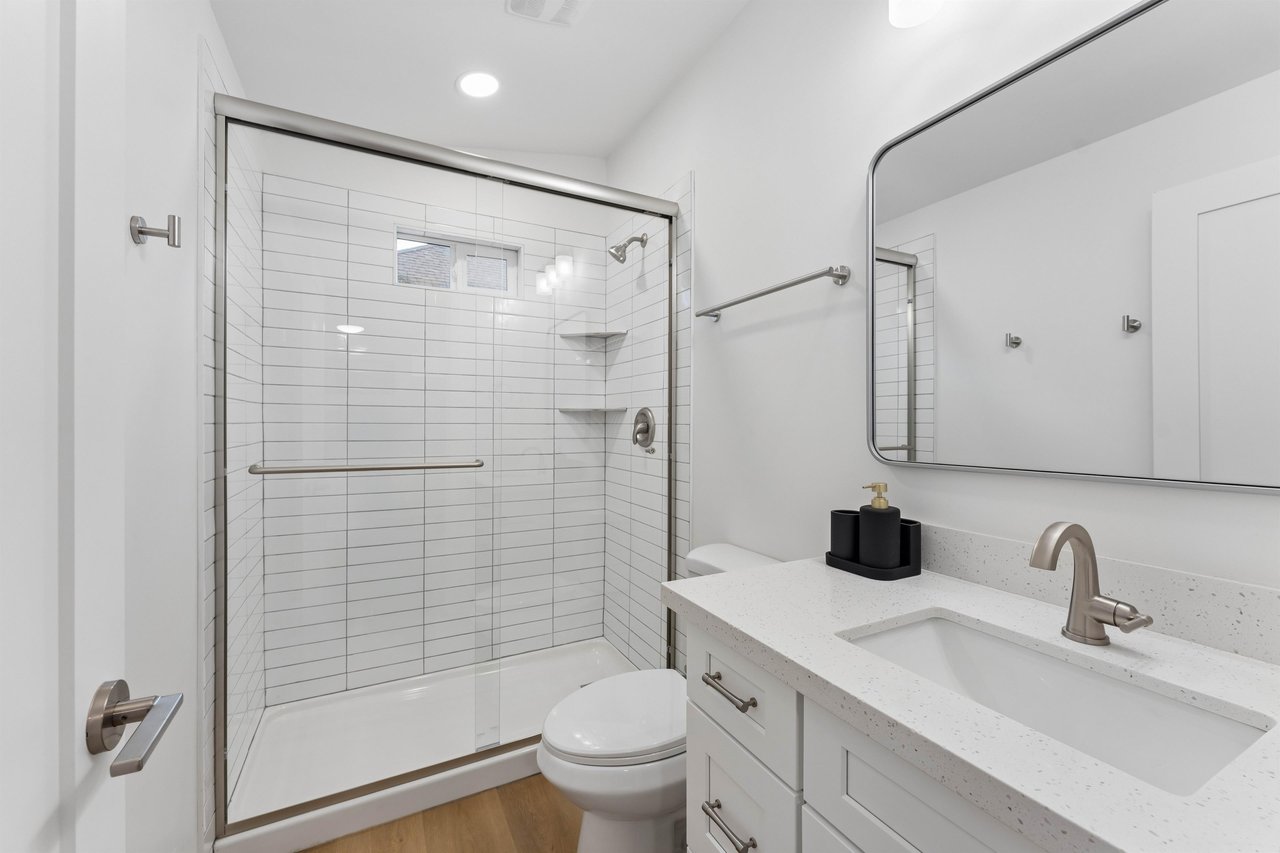 Ensuite bathroom with stand alone shower.