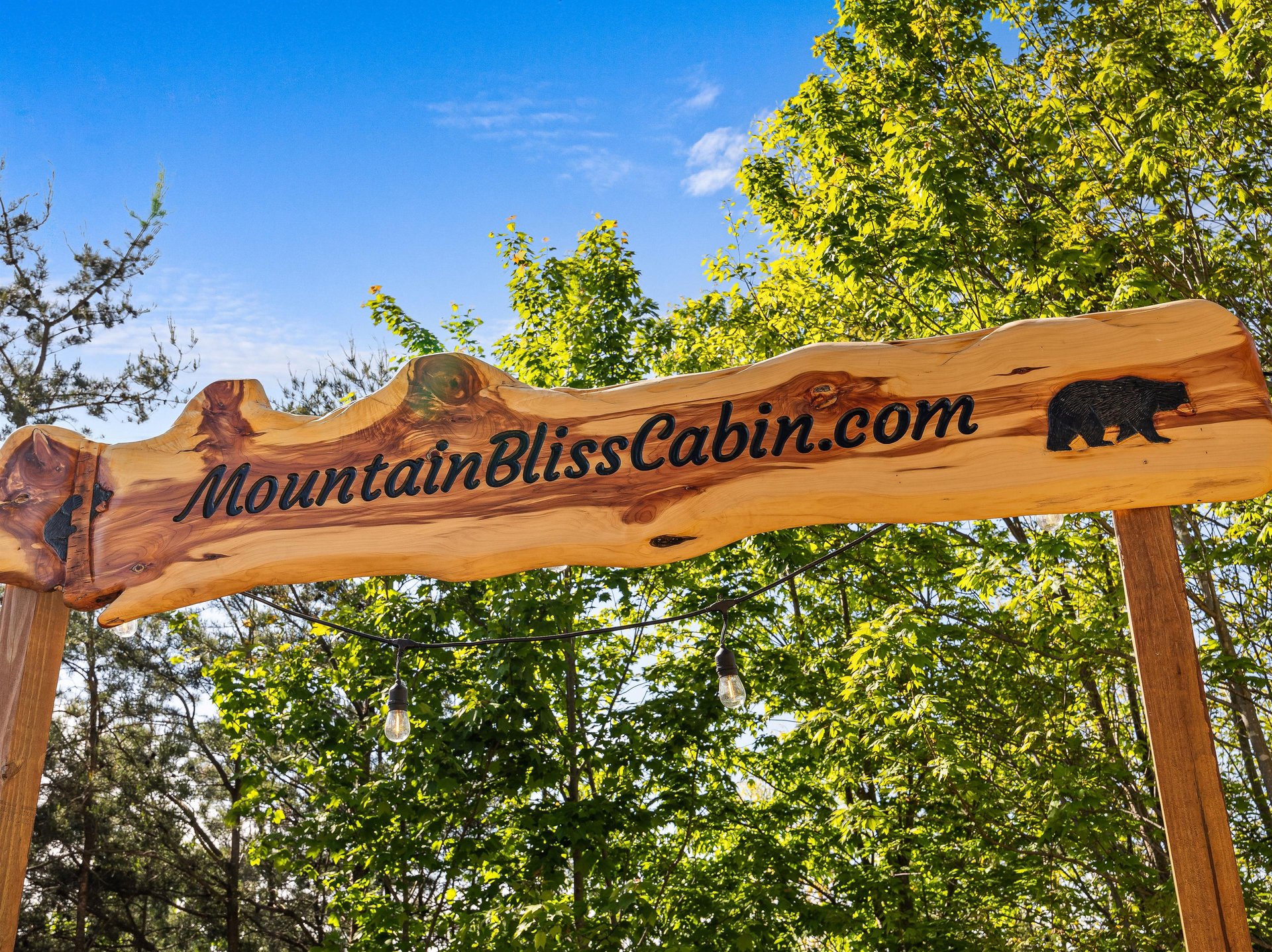 Mountain Bliss sign above outdoor hangout area