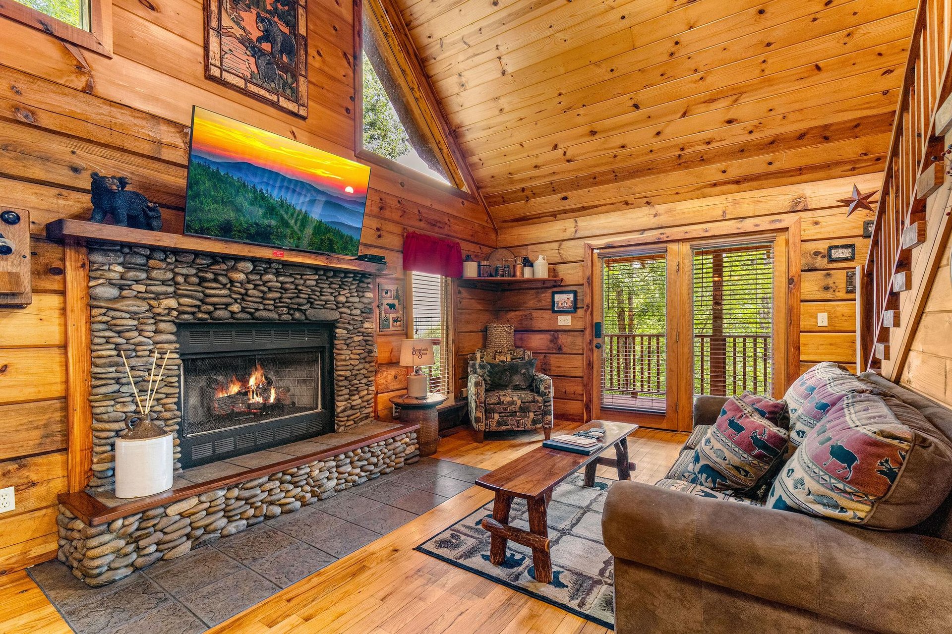 Living room with stone fireplace