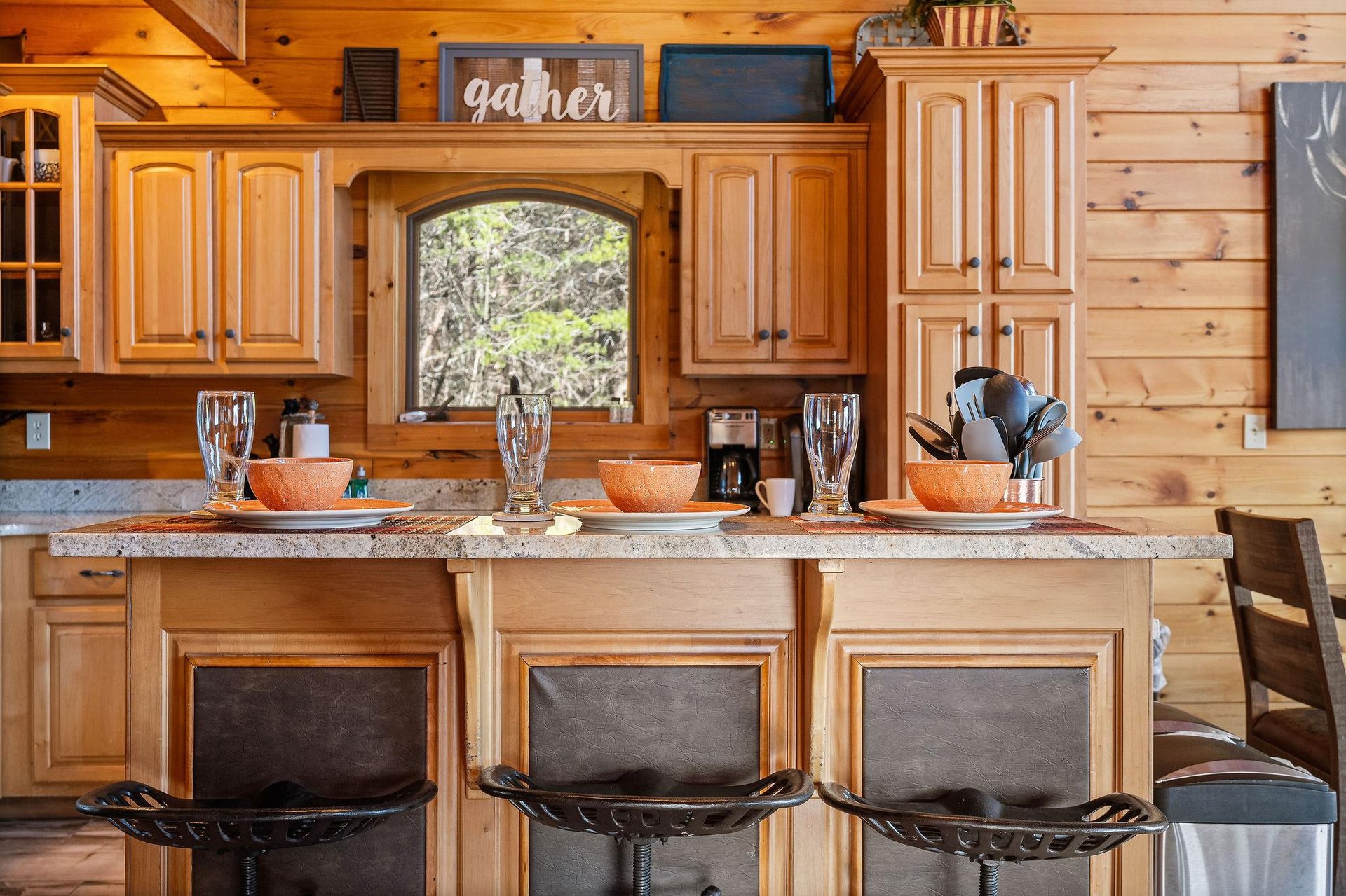 Kitchen with breakfast bar and stainless appliances at Mountain Mama, a 3 bedroom cabin rental located in Pigeon Forge