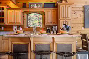 Kitchen with breakfast bar and stainless appliances at Mountain Mama, a 3 bedroom cabin rental located in Pigeon Forge