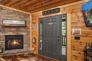 Step into your cozy mountain retreat, where rustic wood and warm firelight welcome you home after exploring the Smokies.