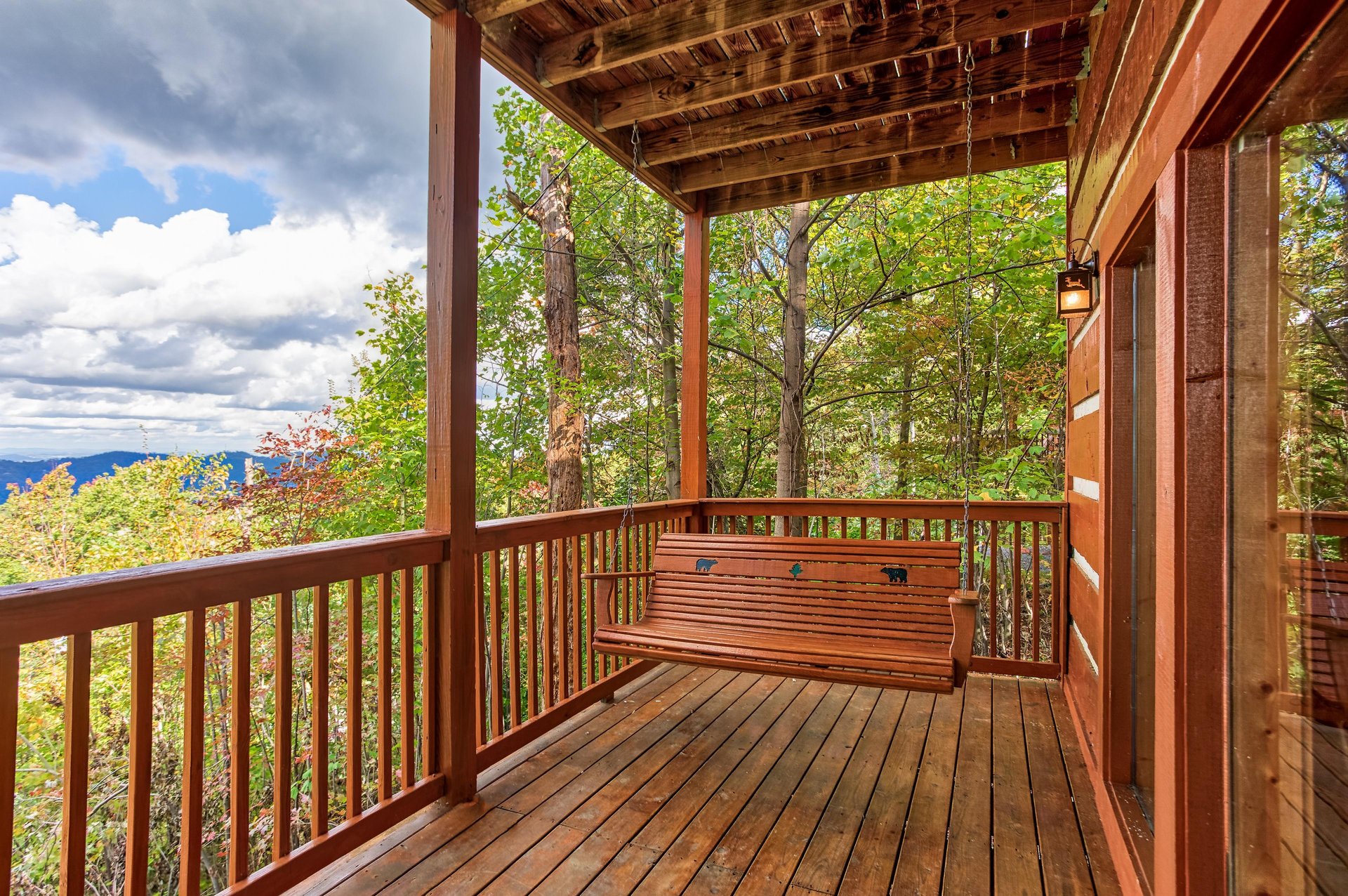 Deck swing at EllaVation, a 3 bedroom cabin rental located in Gatlinburg