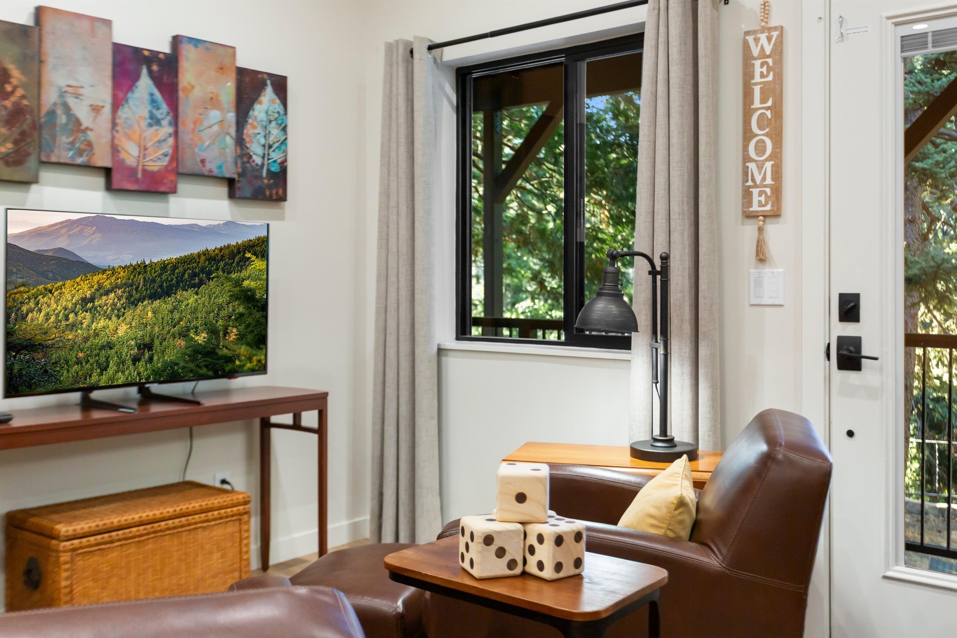 Couch, chairs and a flat screen TV downstairs make entertaining everyone possible.