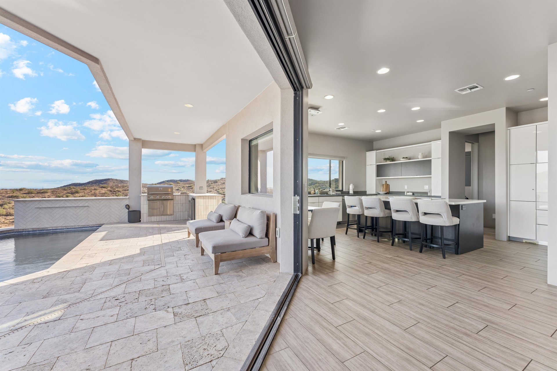 Large sliding doors bring the outdoors, in