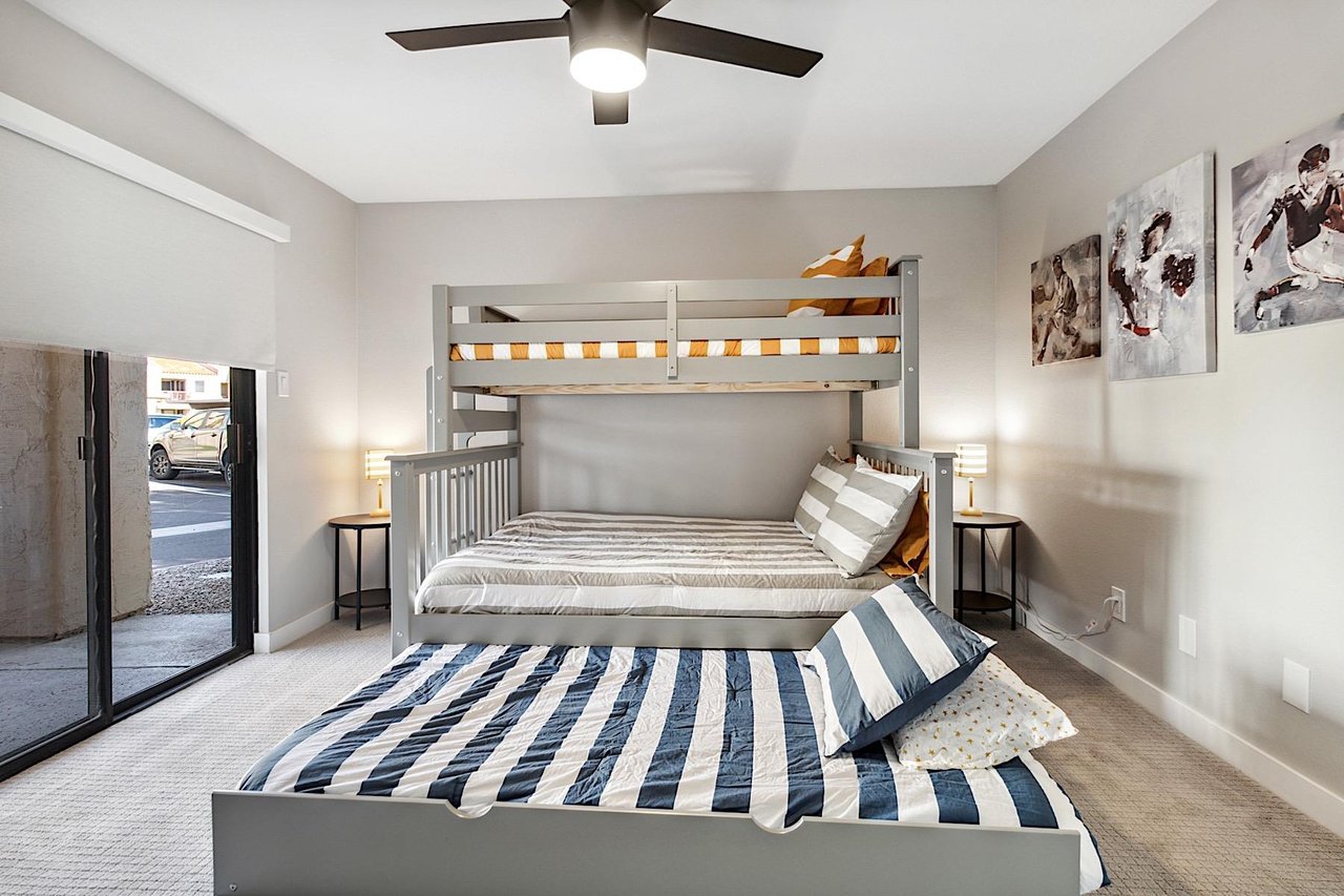 Second bedroom bunk bed. Twin over full bed with pullout twin size trundle at the bottom. Private patio entrance, walkin closet, attached bathroom.