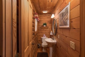 Half bath at Hanky Panky, a 1bedroom cabin rental located in Pigeon Forge