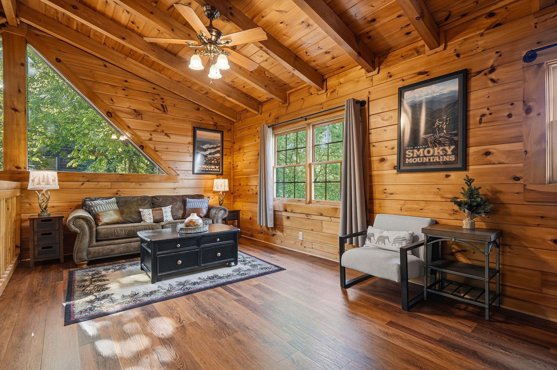 Settle into your cozy mountain retreat where warm wood surrounds you and rustic charm meets comfort in every corner.