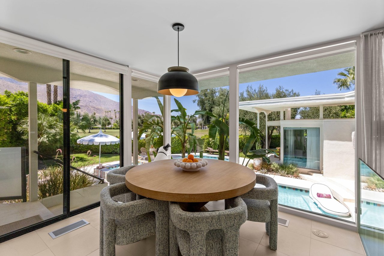 Breakfast nook off of the kitchen with pool views