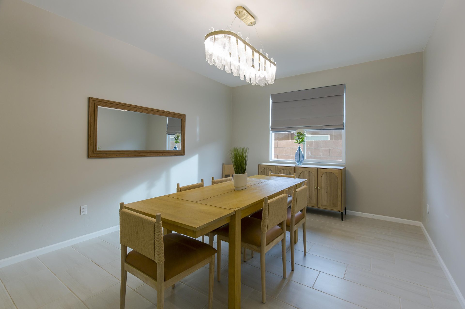 Gorgeous dining room with large table and chairs for 6 guests.
