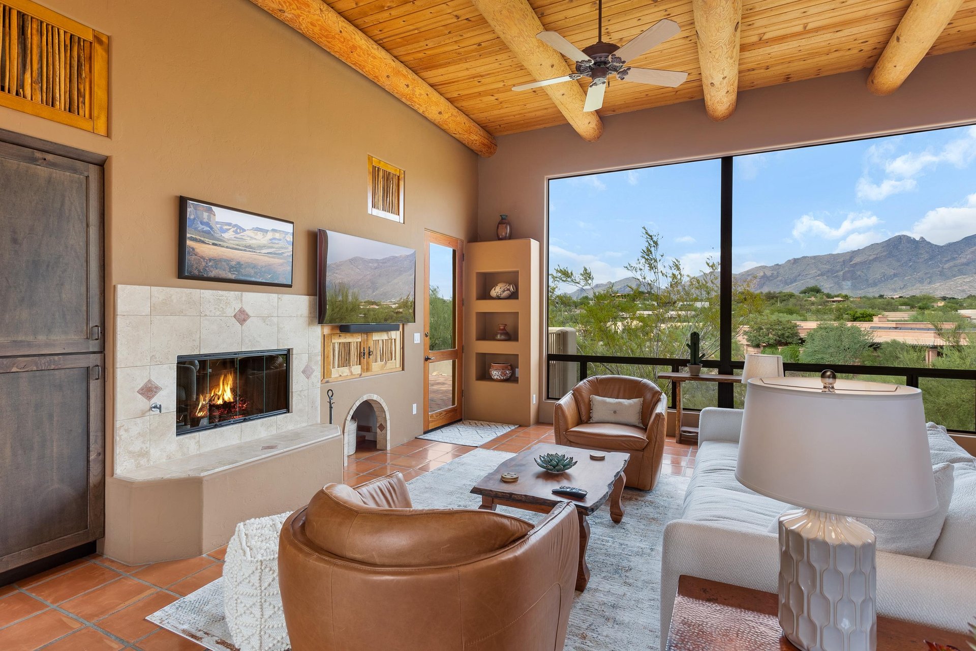 Family room with Cozy fireplace and 65 smart tv