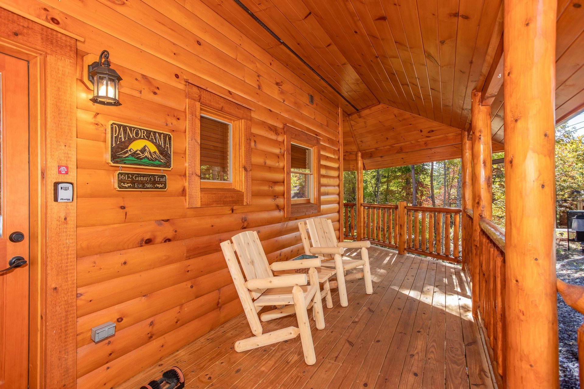 Wooden deck chairs by front door