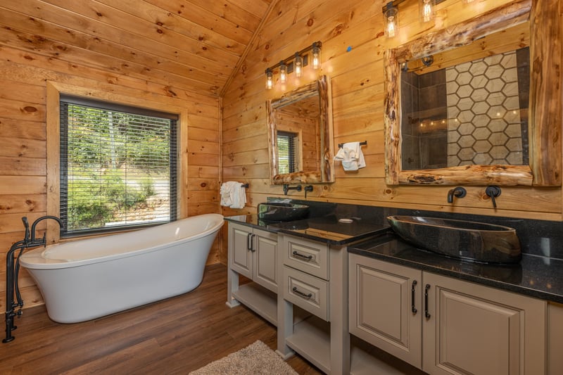 Bathroom with soaker tub and double vanity sinks