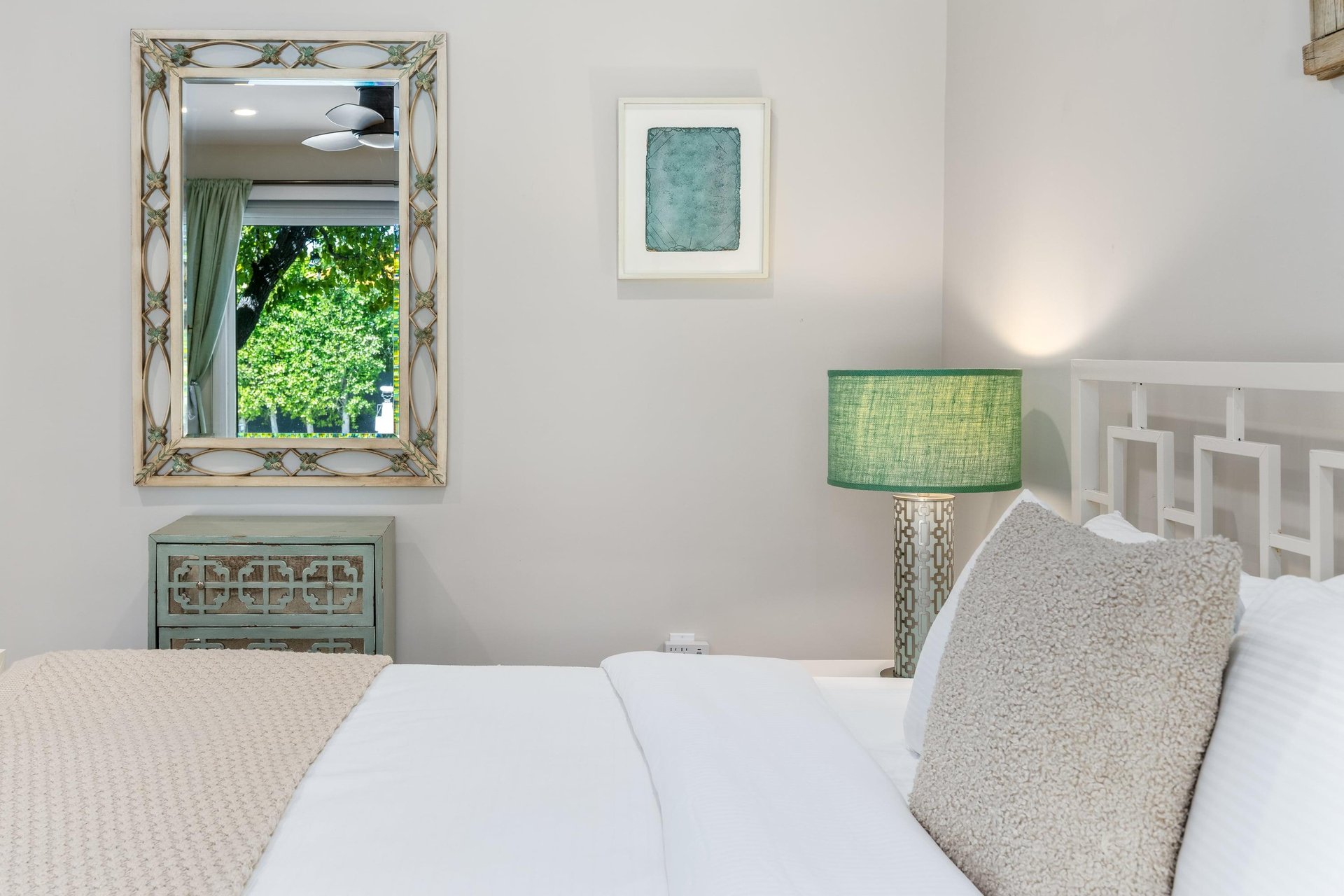 King bed, Smart TV, patio access, and ensuite bathroom.