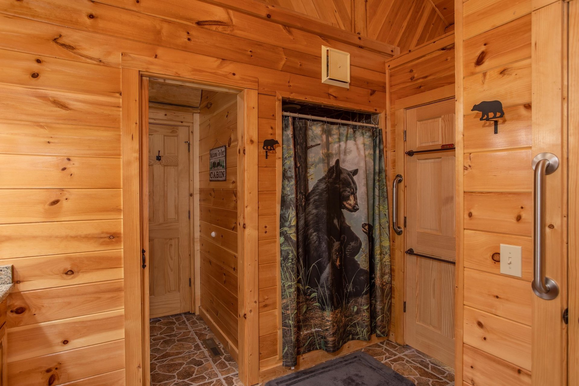 King bedroom en suite with walk in shower at Great View Lodge, a 5bedroom cabin rental located in Pigeon Forge