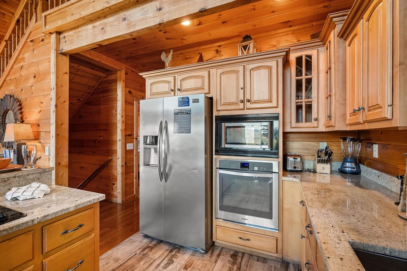 Kitchen with stainless appliances at Mountain Mama, a 3 bedroom cabin rental located in Pigeon Forge