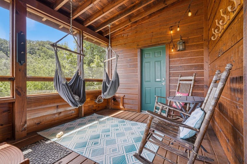 Unwind in your screened porch retreat with hammock swings and rockers—perfect for lazy afternoons surrounded by natures peaceful views.