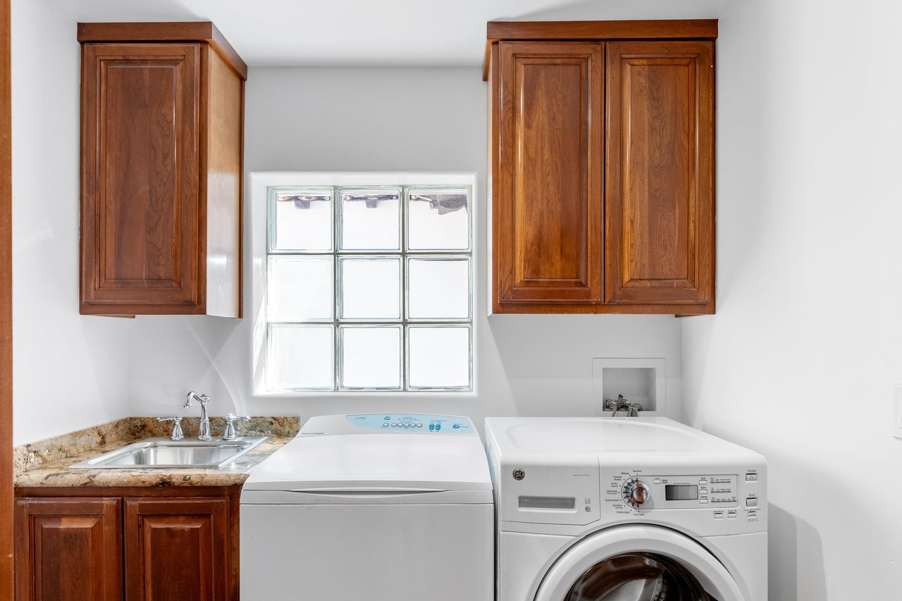 Laundry room adjacent to the kitchen