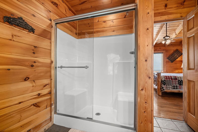 Shower in a bathroom at Mountain Mama, a 3 bedroom cabin rental located in Pigeon Forge