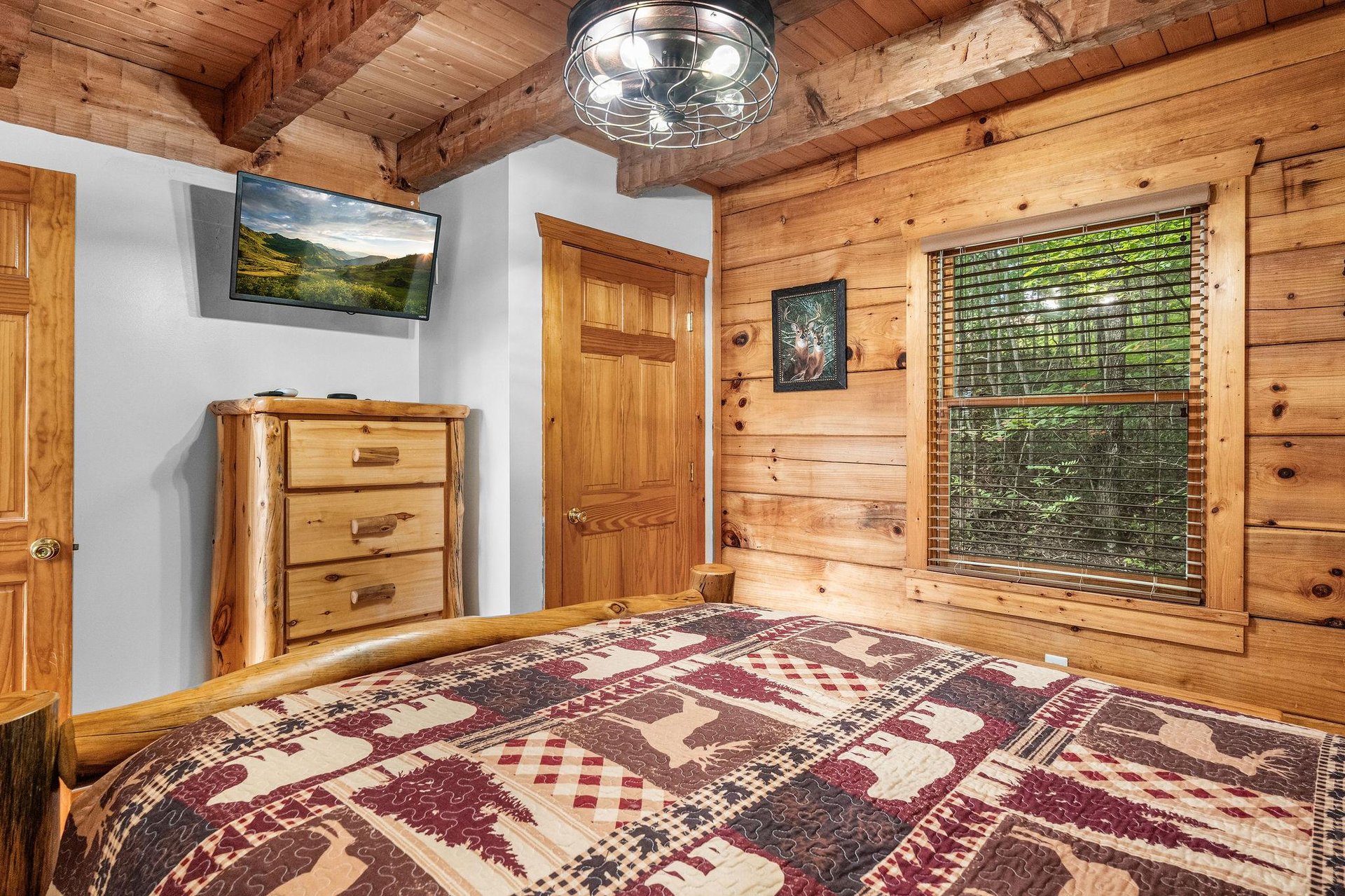 queen bed, dresser and TV