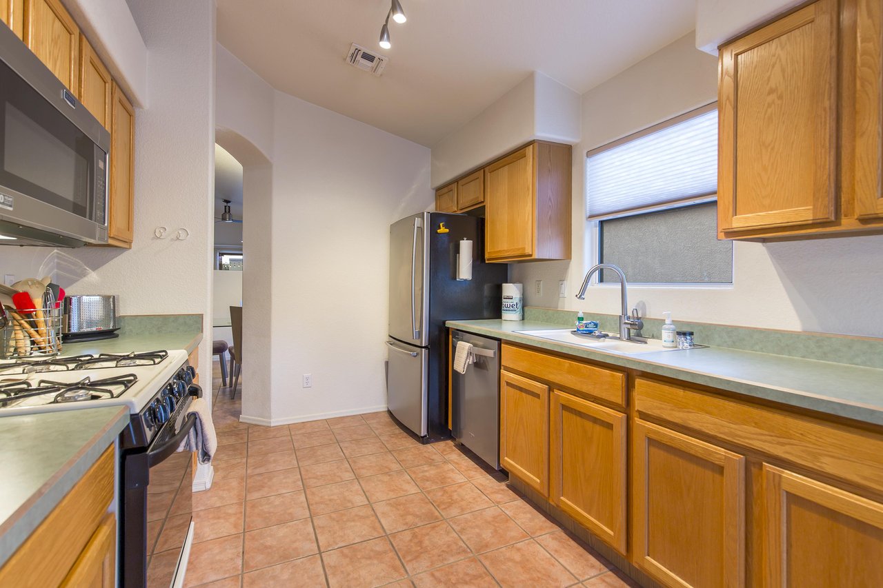 Fully equipped kitchen with easy access to the dining area.