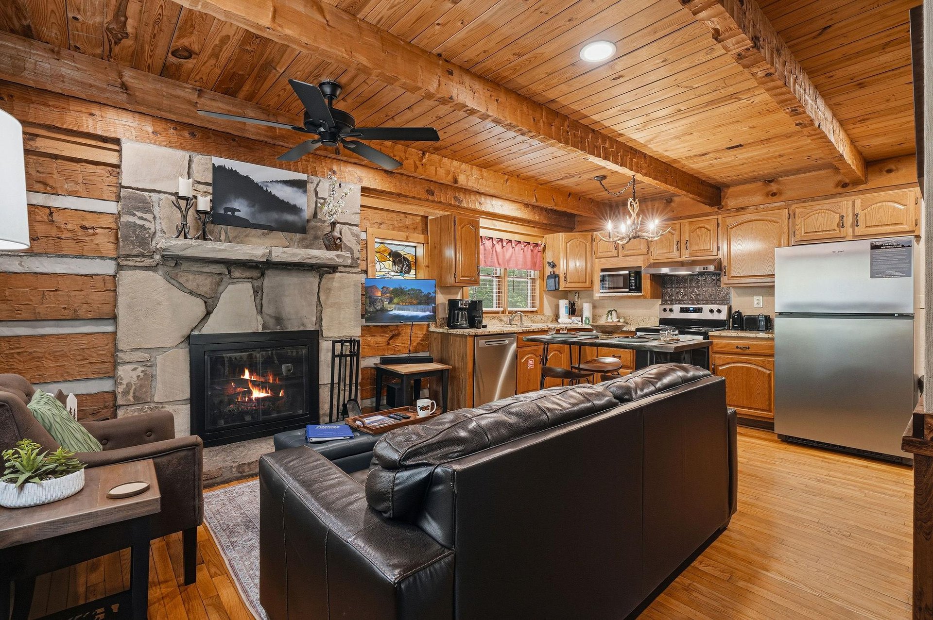 Relax by the stone fireplace or cook in your fully equipped kitchen while exposed beams and warm wood create your cozy mountain retreat.