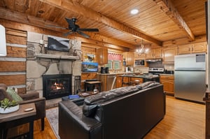 Relax by the stone fireplace or cook in your fully equipped kitchen while exposed beams and warm wood create your cozy mountain retreat.