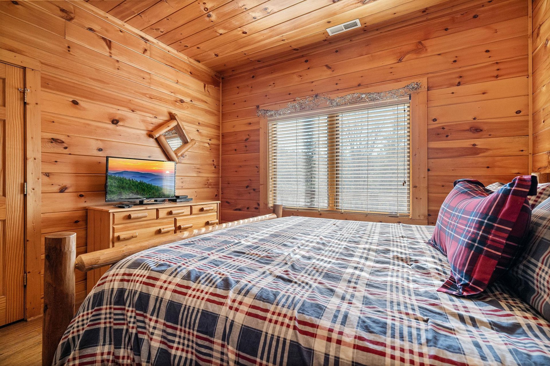 King Bed at Mountain Mama, a 3 bedroom cabin rental located in pigeon forge