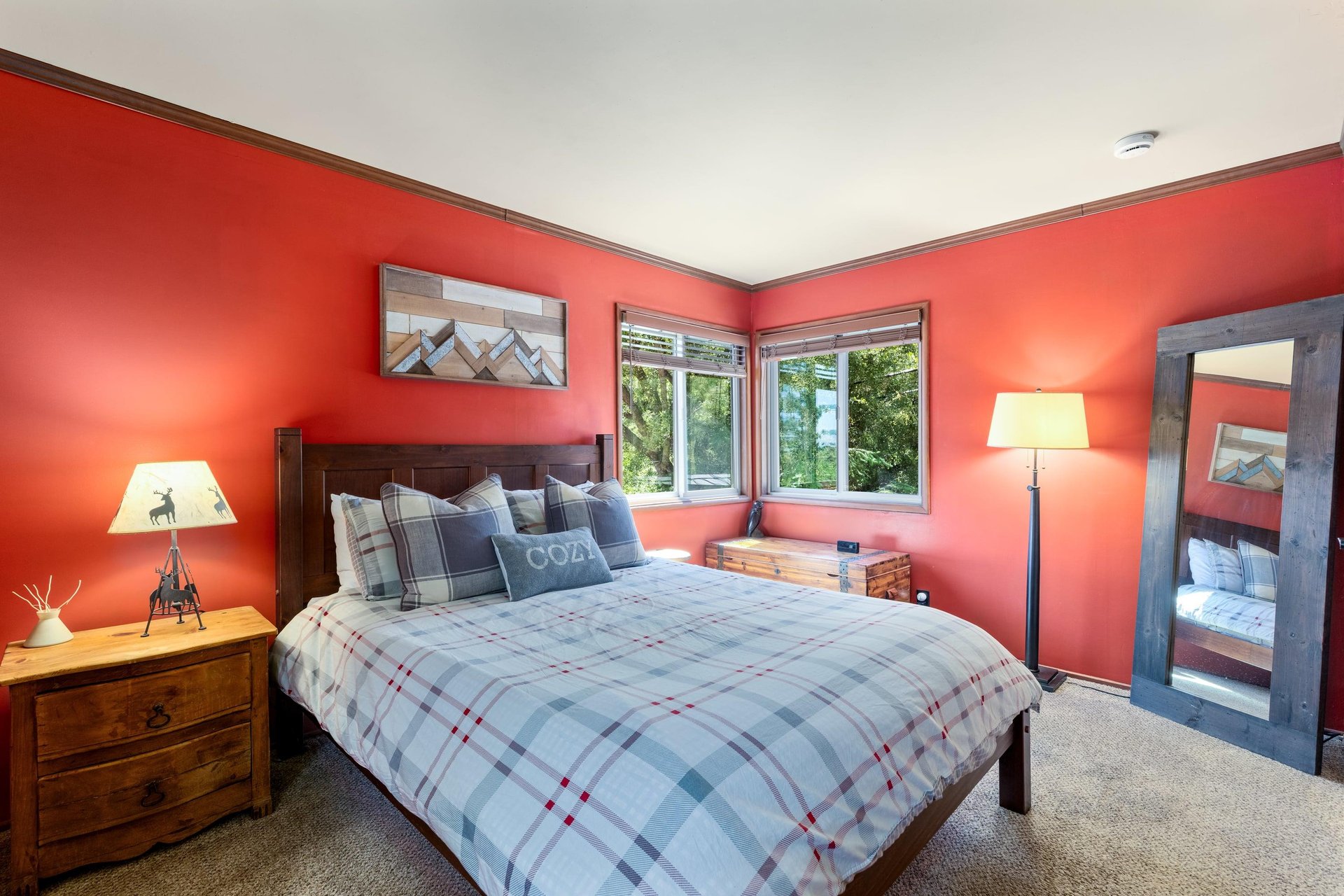 Upstairs second guest bedroom with queen bed.