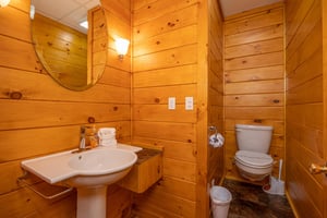 Half bath at Eagles Sunrise, a 2 bedroom cabin rental located in Pigeon Forge