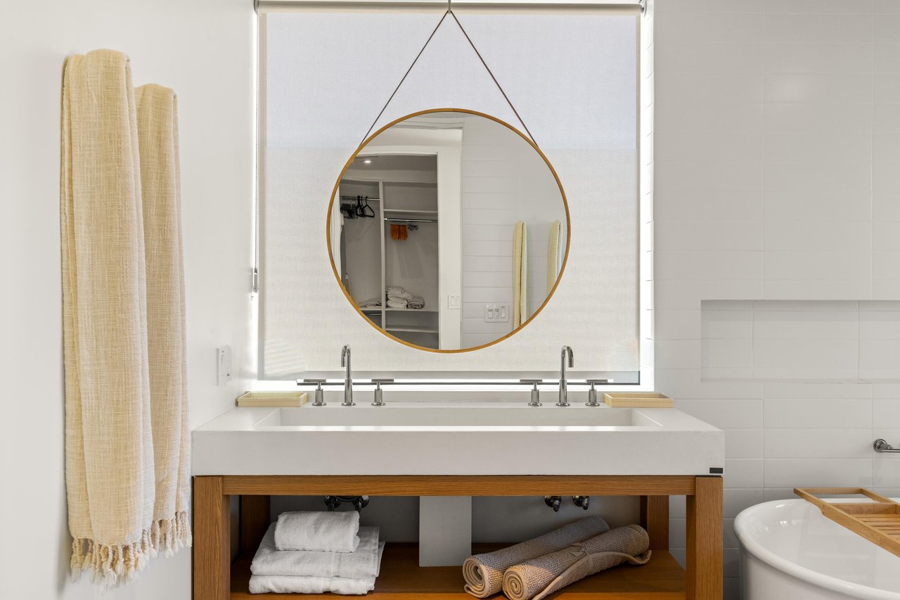 Secondary villa bathroom with dual vanity sink