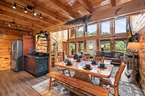 Dining table and chairs near kitchen