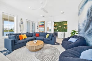 The firstfloor game lounge is designed with all ages in mind, featuring a convenient wet bar and a welcoming atmosphere where young adults, teens, and children can gather for games, fun, and quality 
