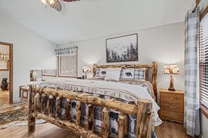 Drift off in your cozy rustic bedroom, surrounded by handcrafted log furniture and mountaininspired décor that makes every night feel like a woodland retreat.