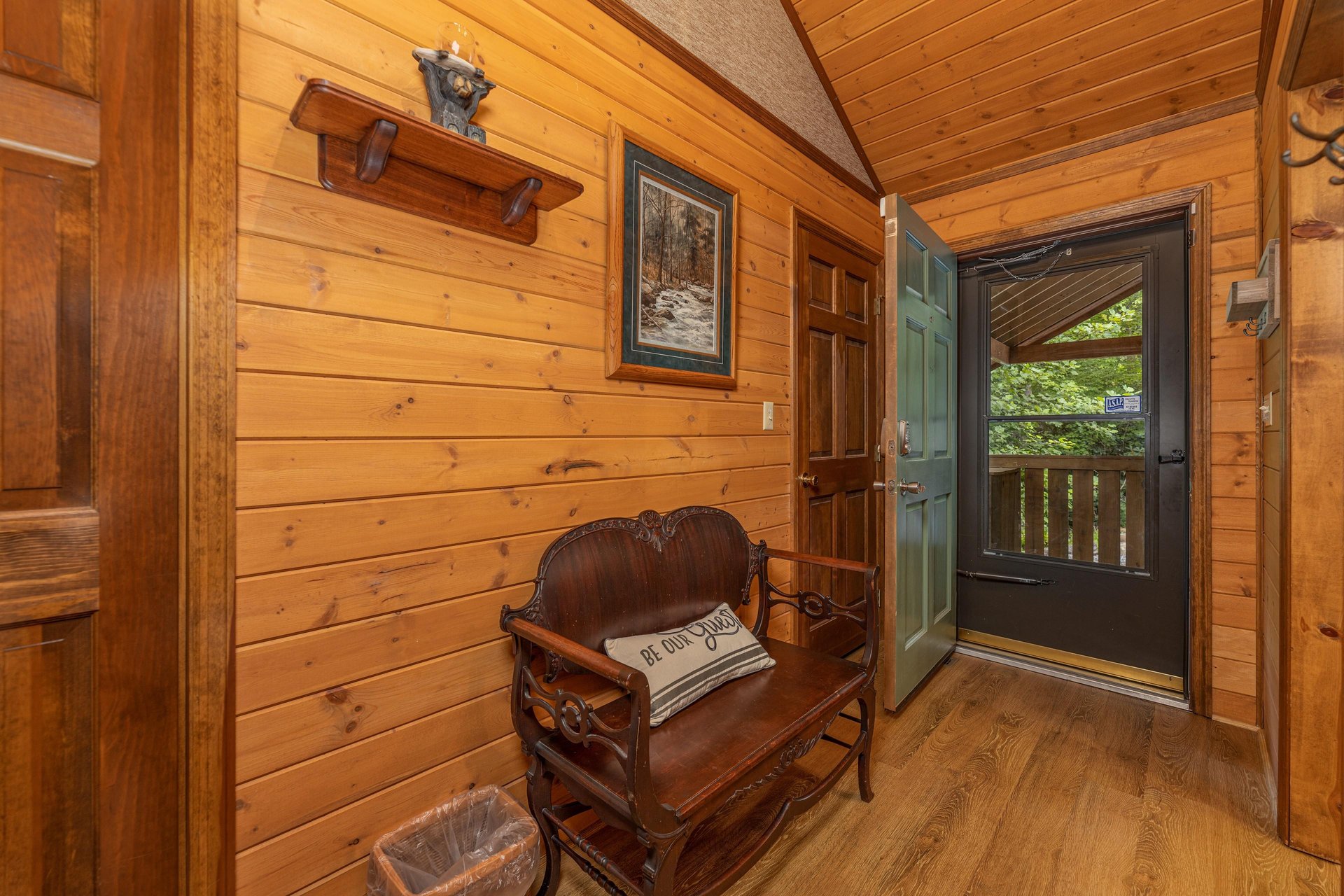 Foyer with a bench at Cubs Crib, a 3 bedroom cabin rental located in Gatlinburg