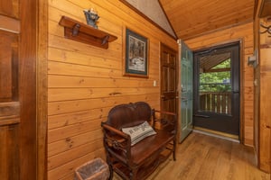 Foyer with a bench at Cubs Crib, a 3 bedroom cabin rental located in Gatlinburg
