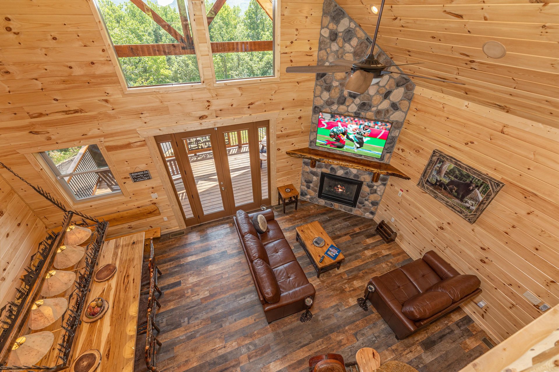 Living room view with stone fireplace