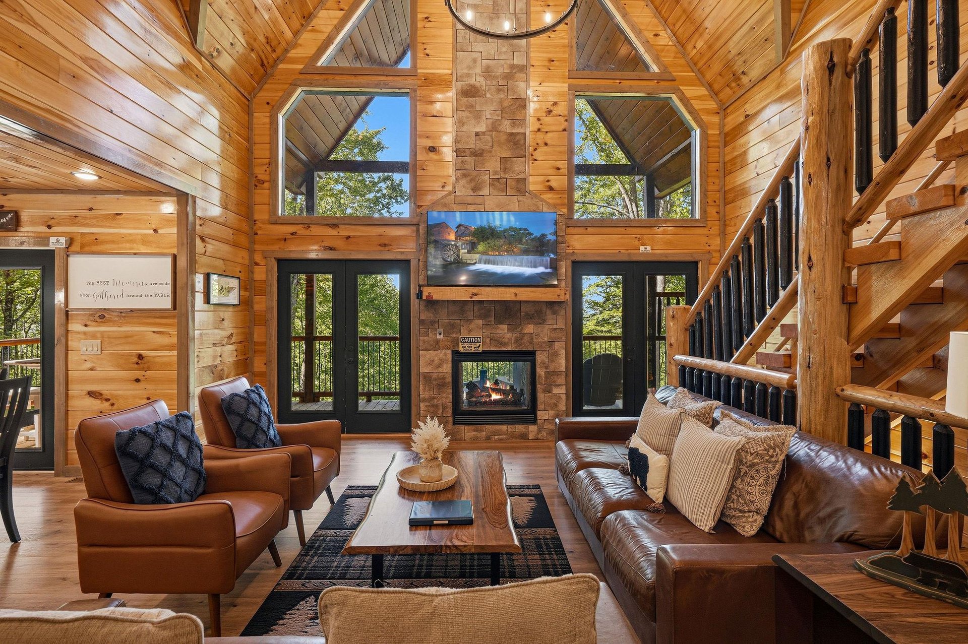 Sink into luxurious leather seating by your crackling fireplace, surrounded by soaring timber beams and panoramic forest views through floortoceiling windows.