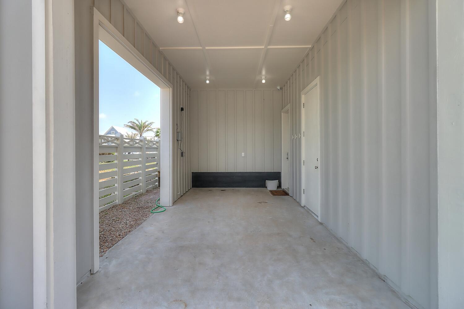 Carport With Exterior Shower Access