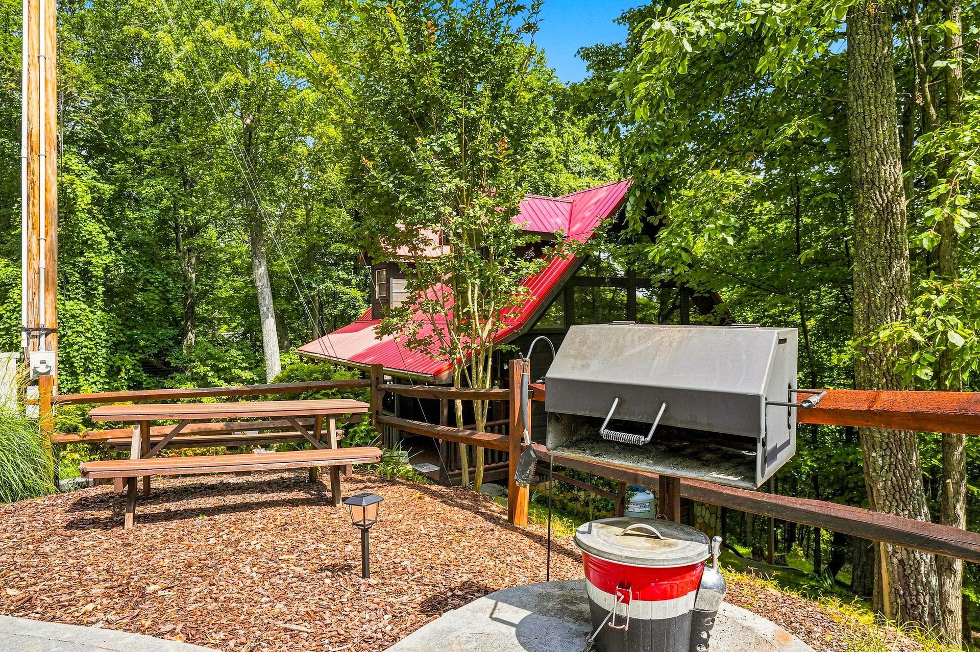 Fire up the grill and gather around the picnic tables in your private forest setting, where lush greenery and fresh air set the scene for memorable cookouts.