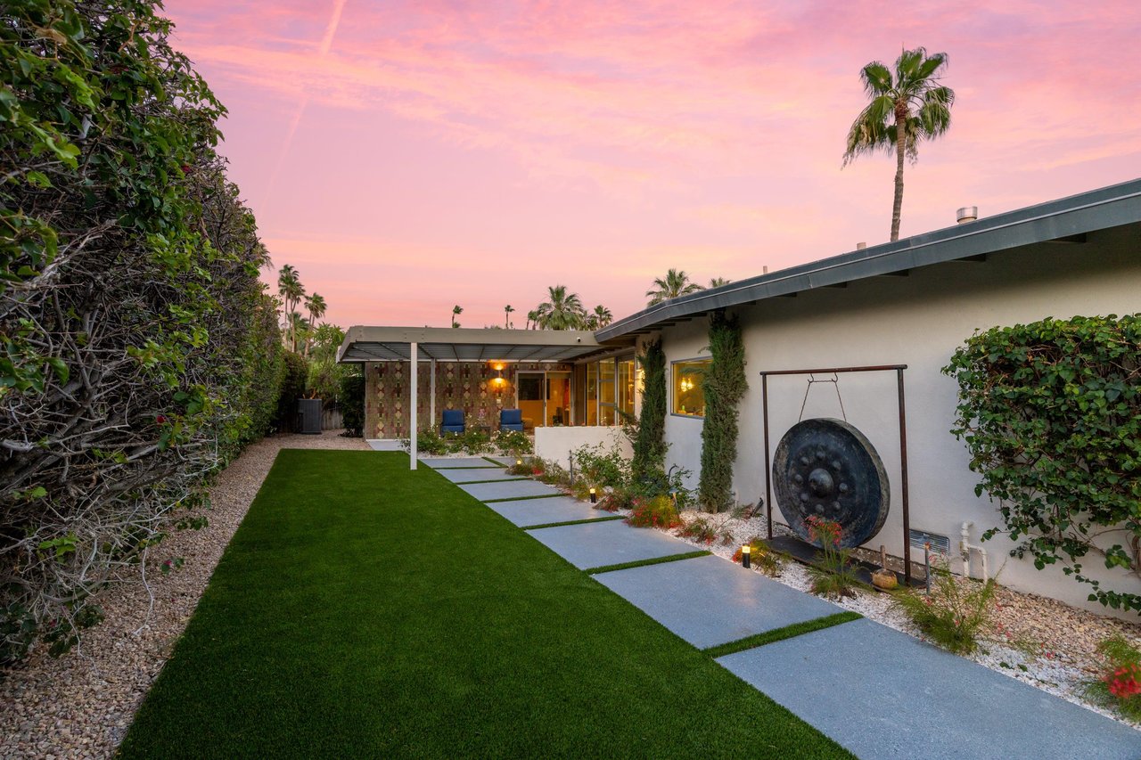 Walkway leading to the front of the home.