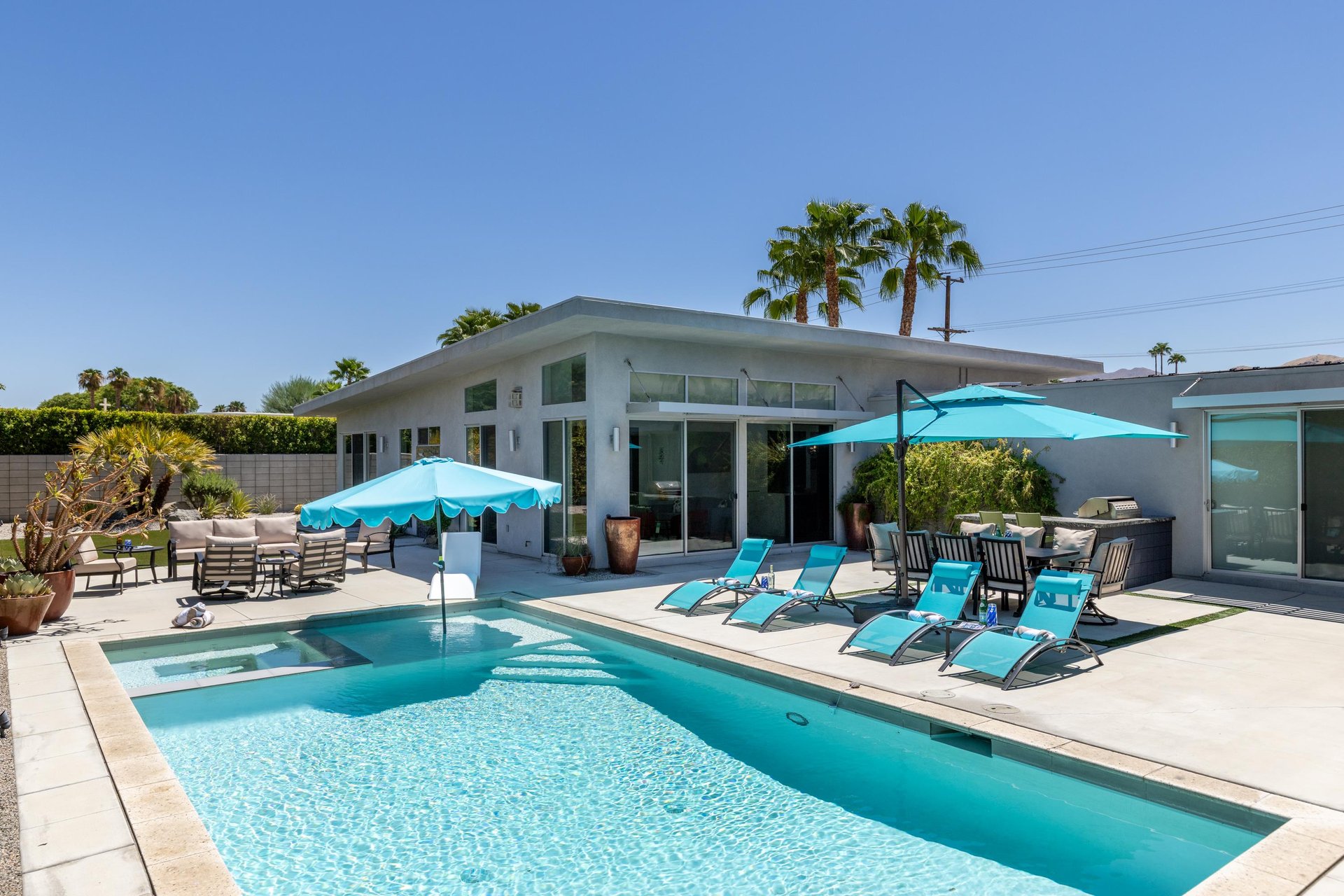 Private pool, spa, outdoor shower, outdoor fire pit, BBQ, and outdoor seating.