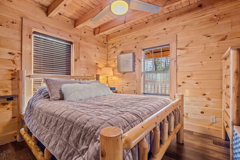 Queen bed with 2 windows