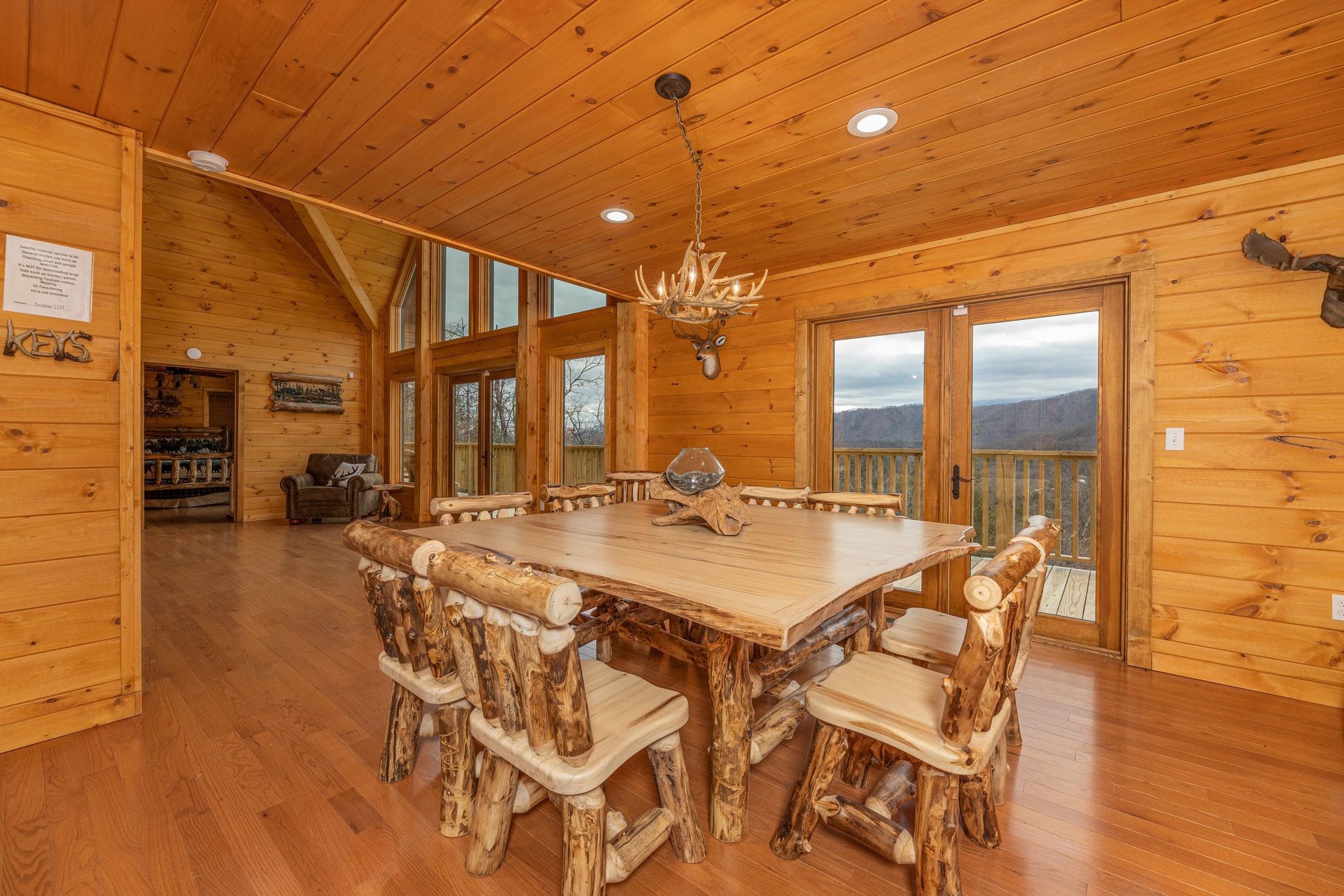 Dining room with table for 8 at Js Hideaway, a 4 bedroom cabin rental located in Pigeon Forge